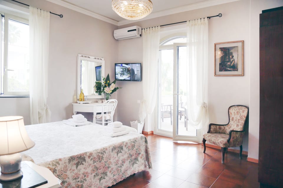 Deluxe Double Room | Down comforters, desk, blackout drapes, rollaway beds