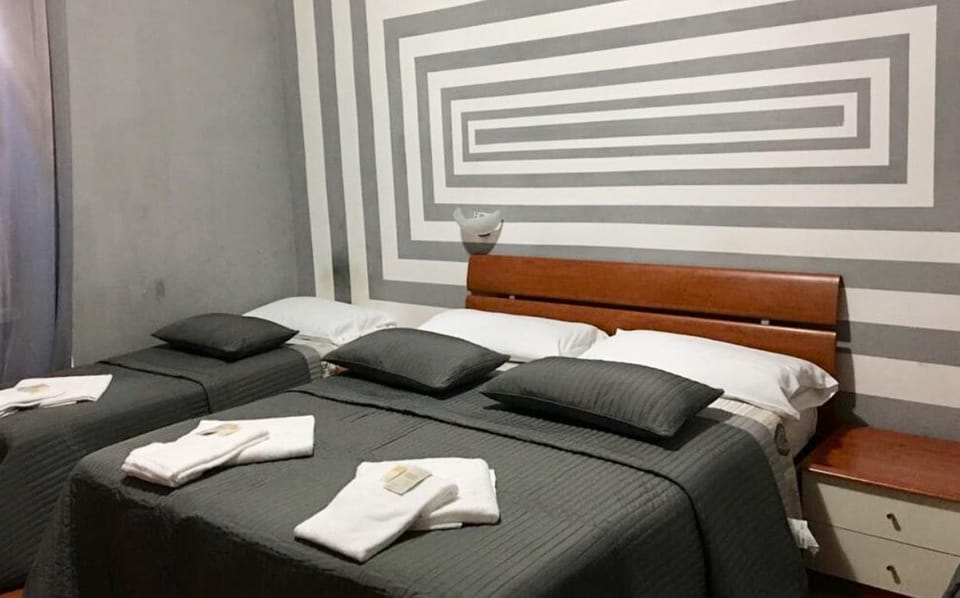 Triple Room, Private Bathroom | In-room safe, desk, soundproofing, iron/ironing board