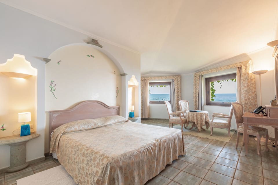 Junior Suite, Sea View | In-room safe, desk, laptop workspace, soundproofing