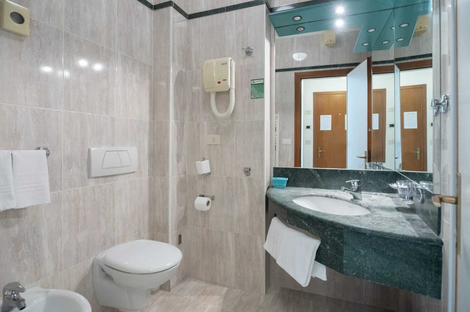 Free toiletries, hair dryer, bidet, towels