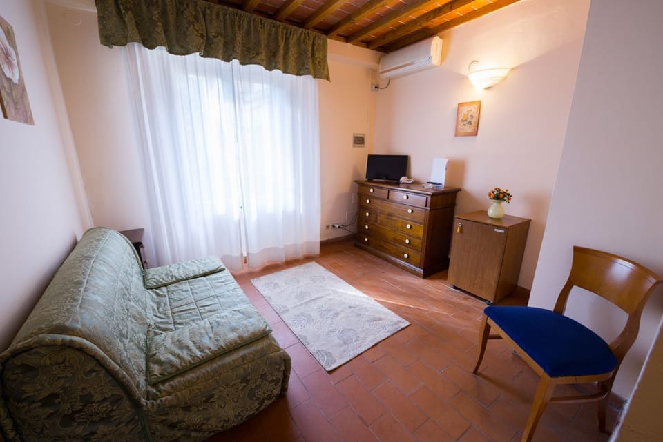 Triple Room | Down comforters, minibar, in-room safe, free WiFi
