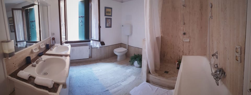 Separate tub and shower, deep soaking tub, free toiletries, hair dryer