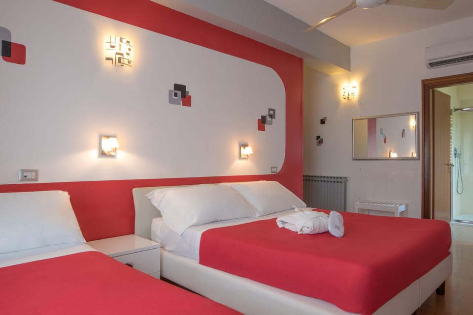 Comfort Triple Room | Minibar, in-room safe, desk, soundproofing
