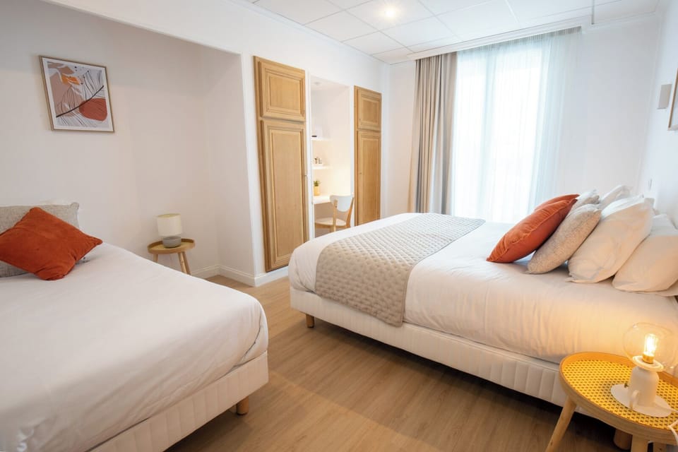 Standard Triple Room | Pillowtop beds, individually furnished, desk, laptop workspace