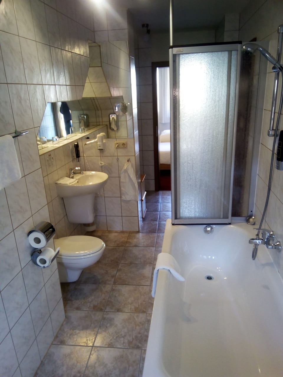 Shower, free toiletries, hair dryer, towels