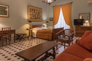 Frette Italian sheets, premium bedding, down comforters, minibar