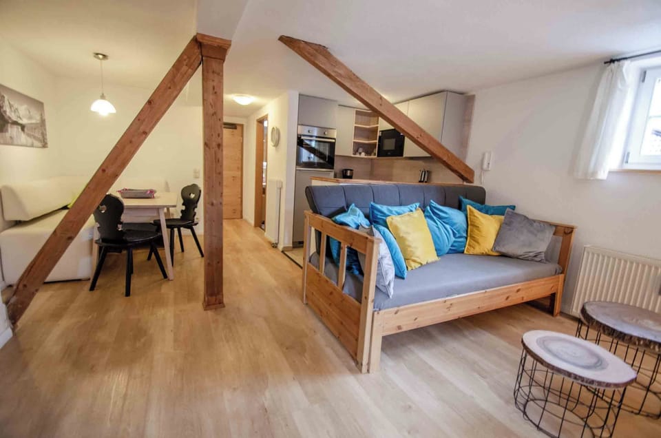 Romantic Condo, 1 Bedroom, Balcony | Living area | 30-inch flat-screen TV with satellite channels