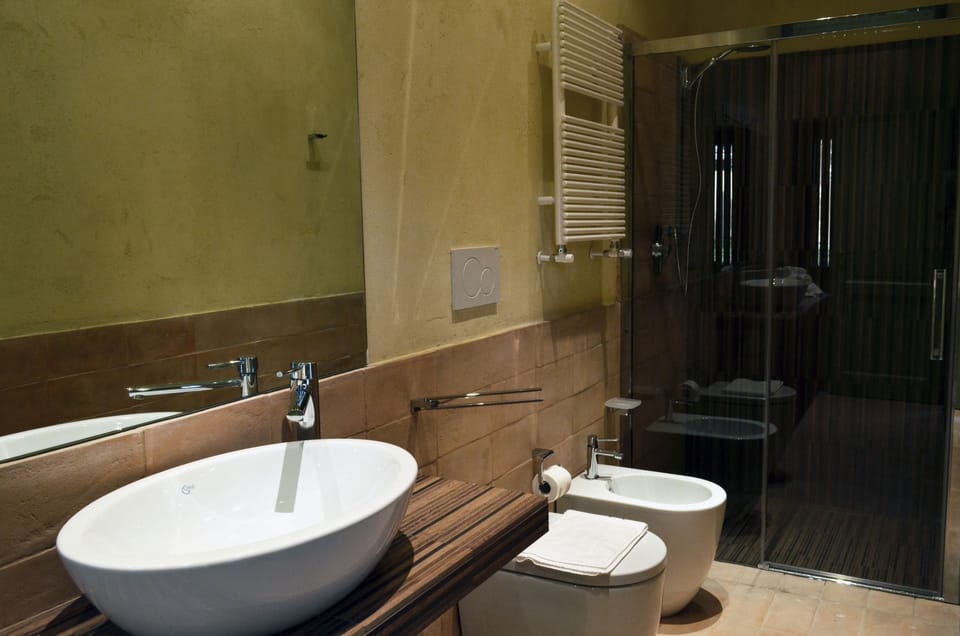 Apartment, 2 Bedrooms (Poderino) | Bathroom | Shower, bidet, towels, soap