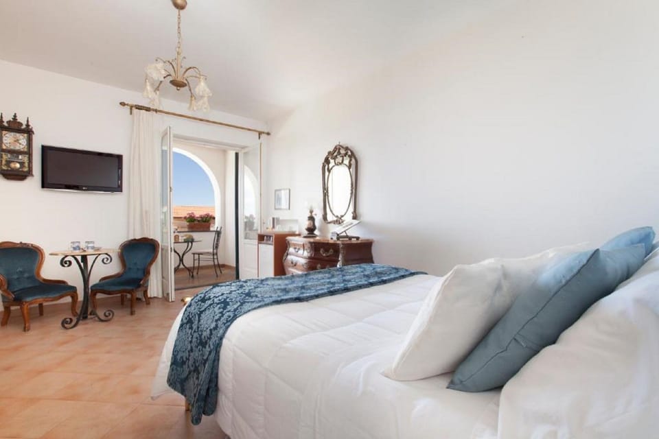 Triple Room, Balcony, Sea View | In-room safe, desk, blackout drapes, soundproofing