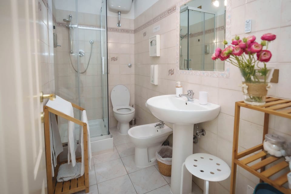Double or Twin Room | Bathroom | Combined shower/tub, free toiletries, hair dryer, bidet
