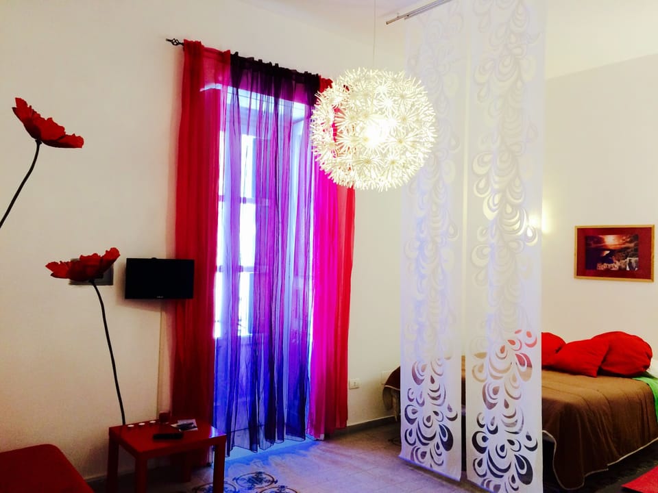 Triple Room | Living area | TV
