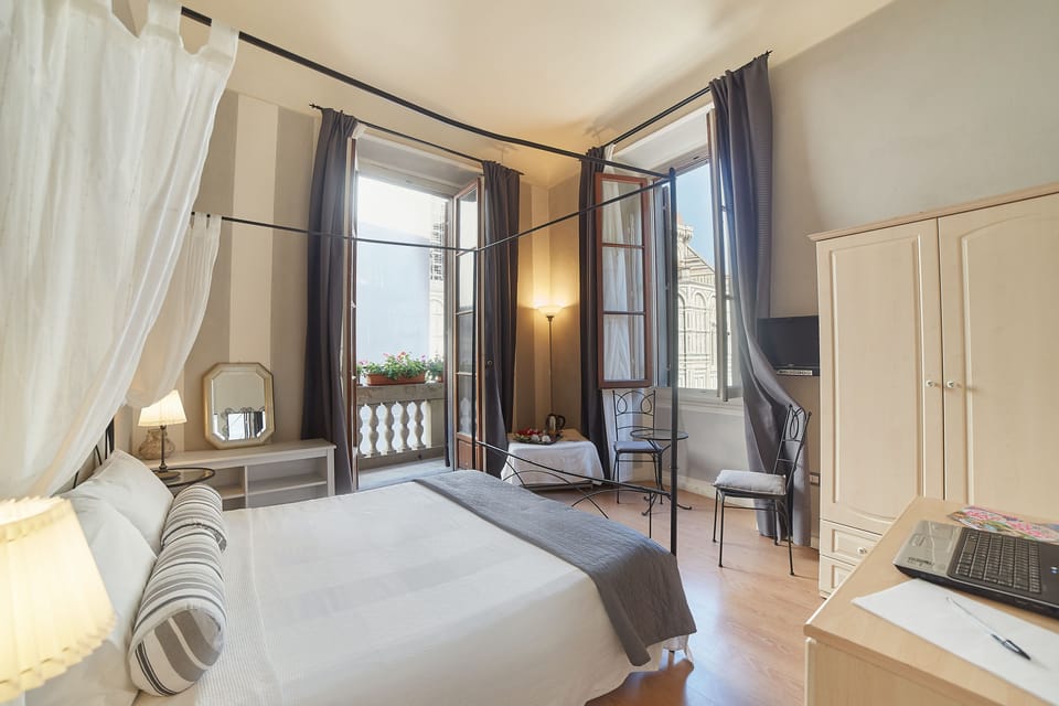 Deluxe Double Room, Non Smoking, Ensuite (Vista Duomo) | In-room safe, blackout drapes, soundproofing, free WiFi