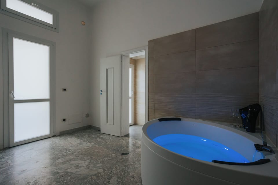 Luxury Apartment, Hot Tub | Bathroom | Shower, hydromassage showerhead, hair dryer, bathrobes