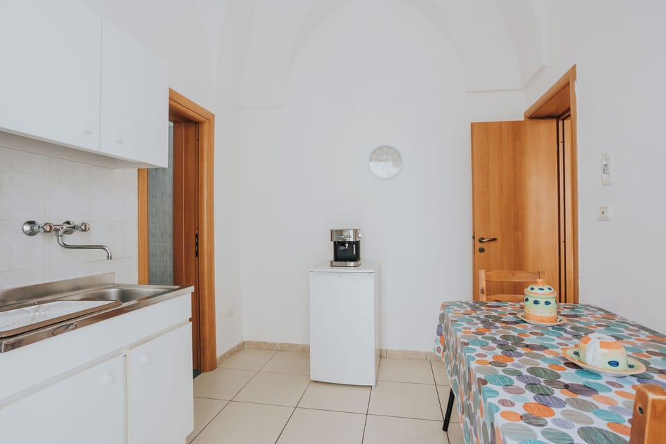 Apartment, 1 Bedroom, Garden View | Private kitchen | Fridge, dining tables