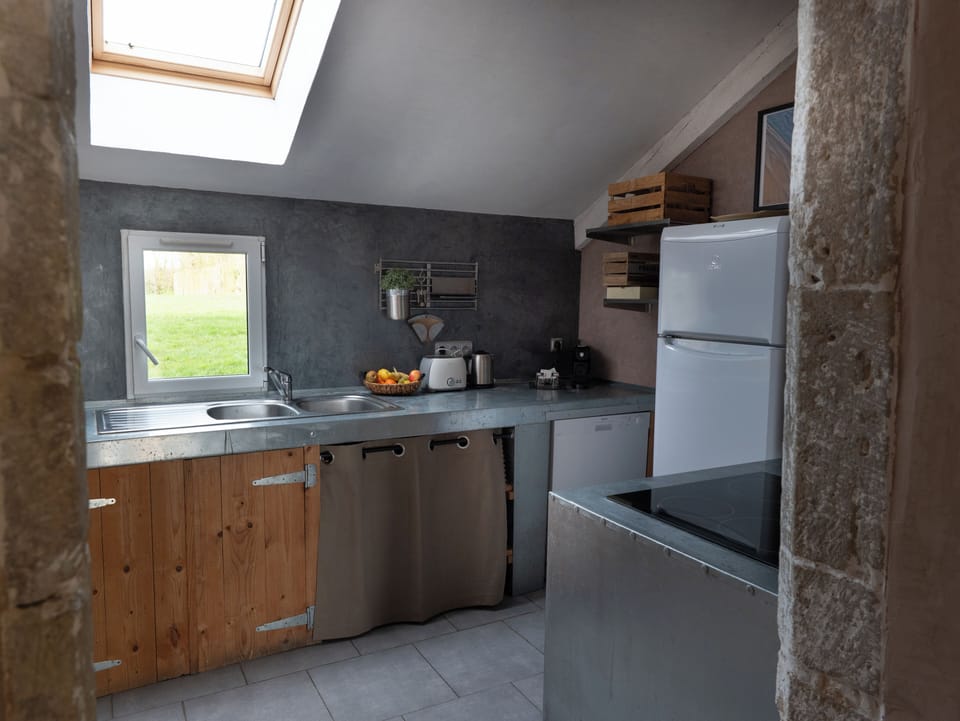 Family House (Le Pigeonnier) | Private kitchen | Full-size fridge, microwave, oven, stovetop