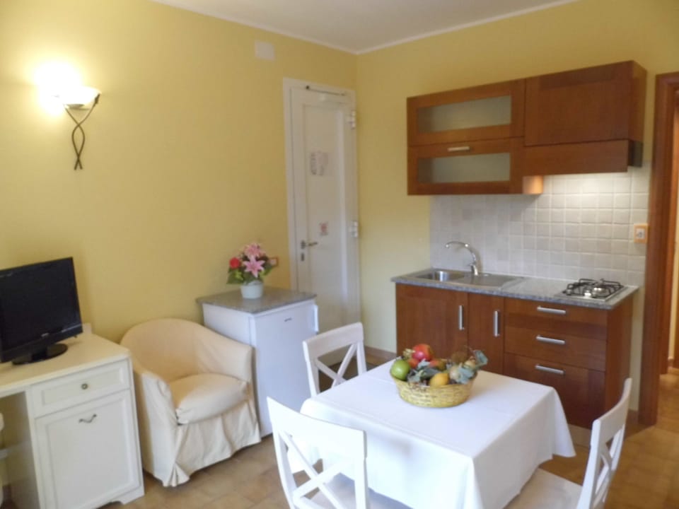 Deluxe Studio Suite, Balcony, Garden Area | Living room | 20-inch LED TV with digital channels, TV