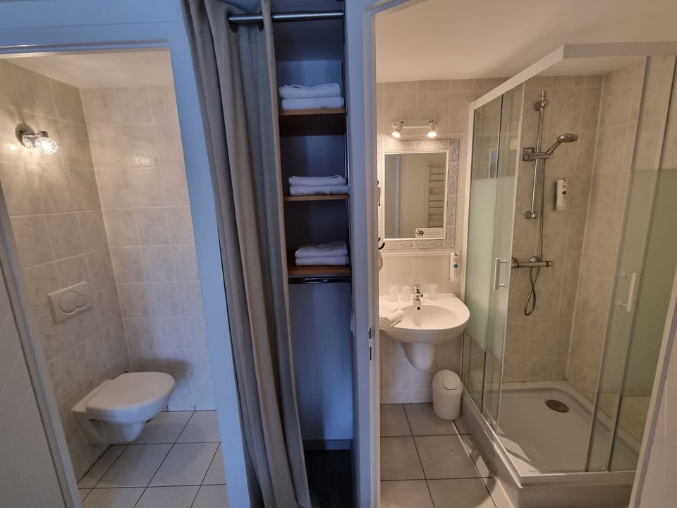Shower, free toiletries, hair dryer, towels