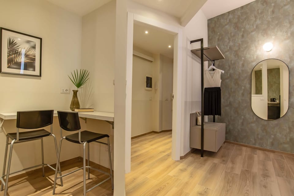 Family Suite (Via della Giuliana 18) | Living area | 30-inch LCD TV with digital channels, TV