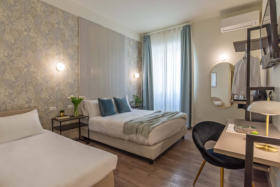 Family Quadruple Room | Premium bedding, minibar, in-room safe, desk