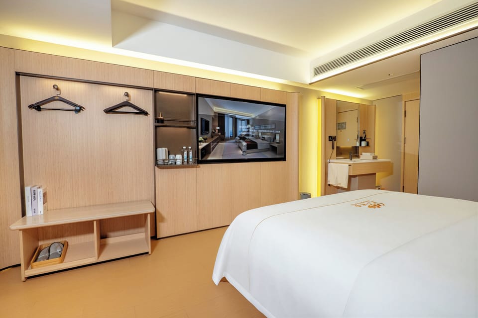 Deluxe Double Room | Down comforters, in-room safe, individually decorated, desk