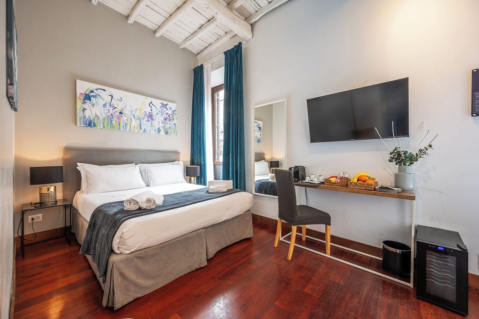 Family Quadruple Room | Premium bedding, minibar, in-room safe, desk