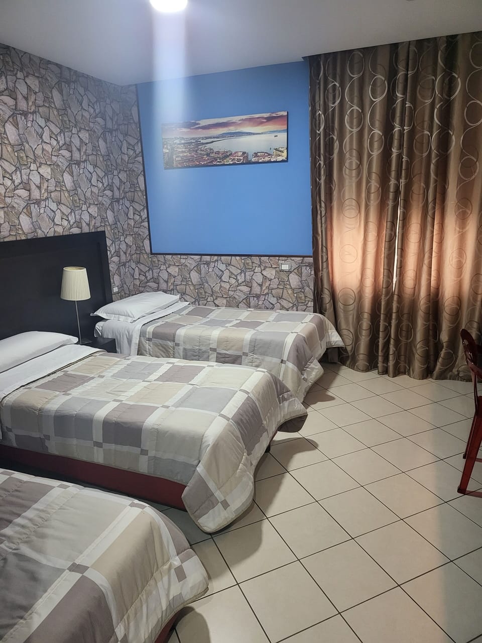 Basic Triple Room, 1 Bedroom | Minibar, in-room safe, desk, laptop workspace