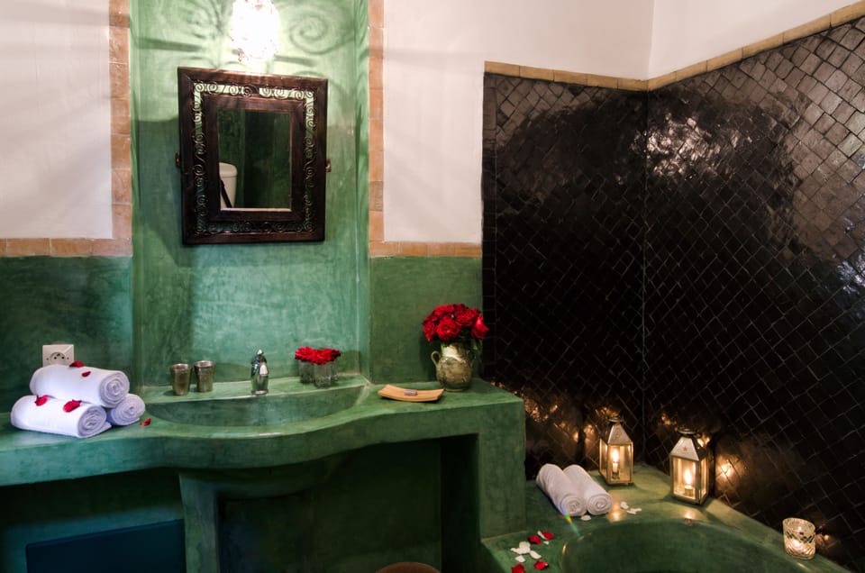 Designer toiletries, hair dryer, towels, soap