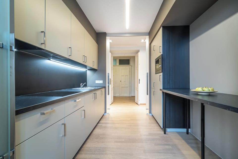 Two Bedroom Apartment, City View | Private kitchen | Fridge, microwave, stovetop, highchair