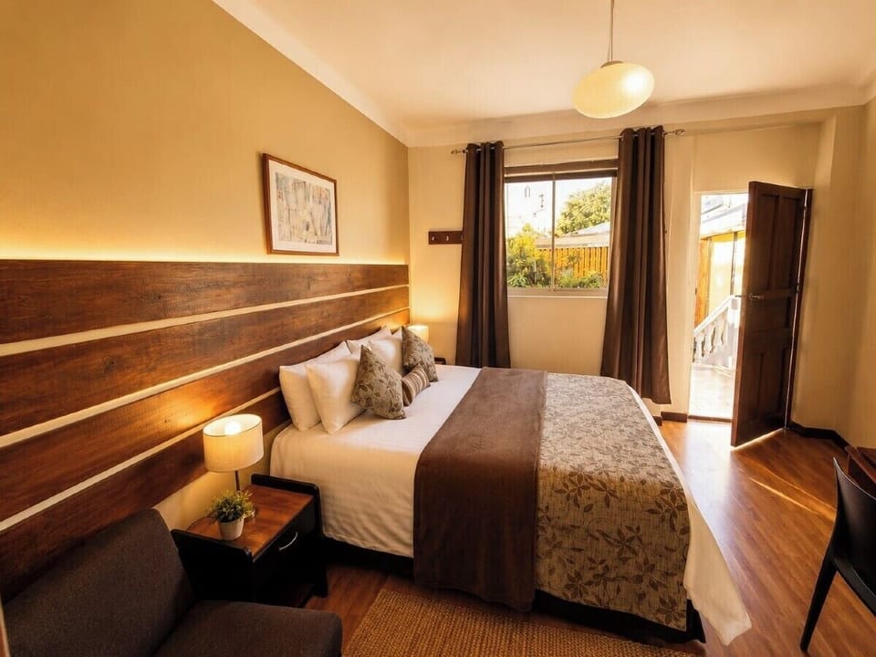 Comfort Double Room, Garden View | Down comforters, desk, laptop workspace, free WiFi