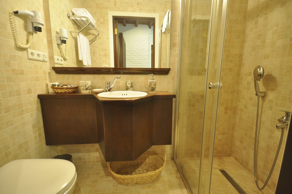 Shower, free toiletries, hair dryer, bathrobes