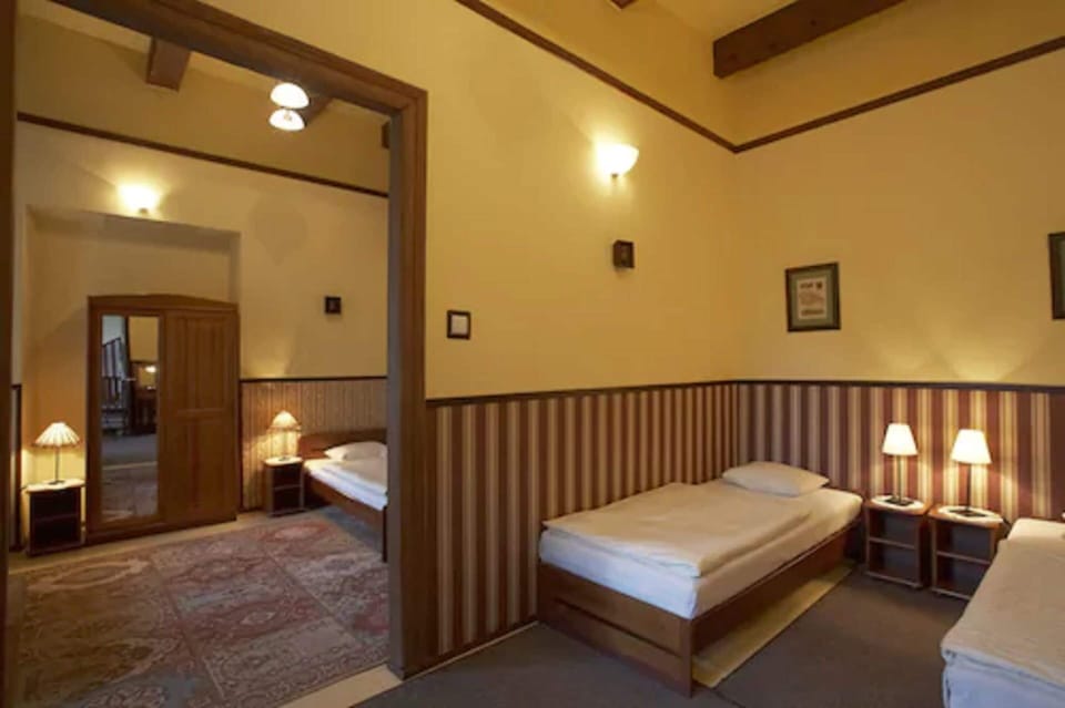 Quadruple Room | Living area | TV, table tennis, pay movies