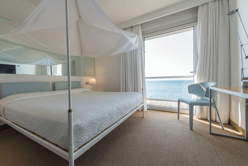 Romantic Double Room, Balcony, Sea View | Minibar, in-room safe, desk, soundproofing