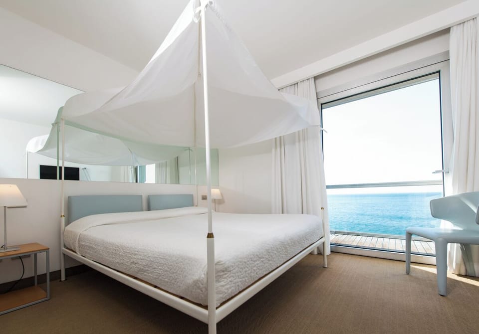Romantic Double Room, Balcony, Sea View | Minibar, in-room safe, desk, soundproofing