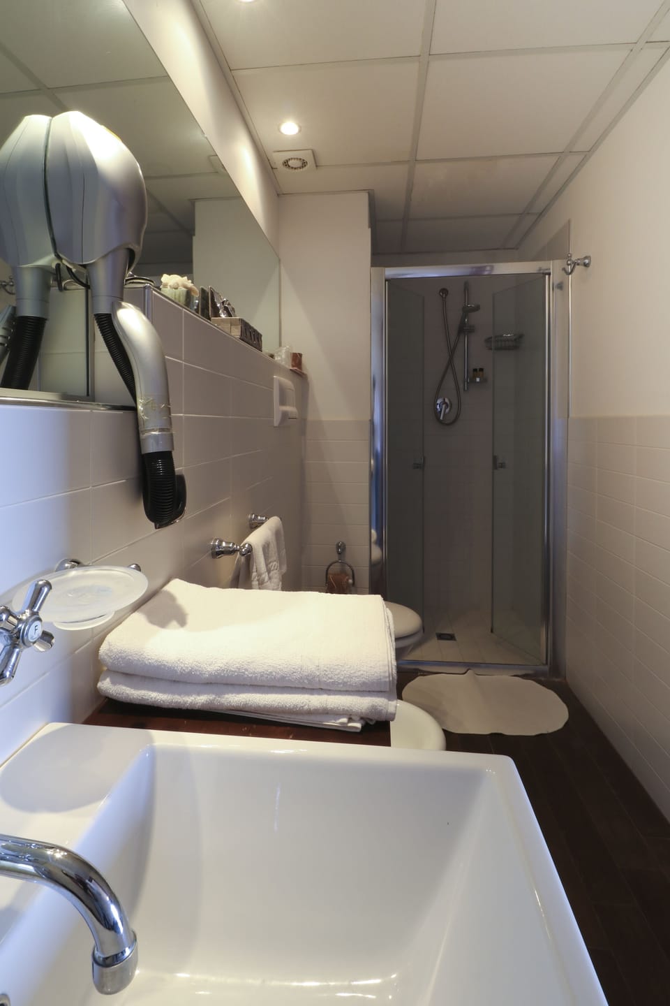 Shower, free toiletries, hair dryer, slippers