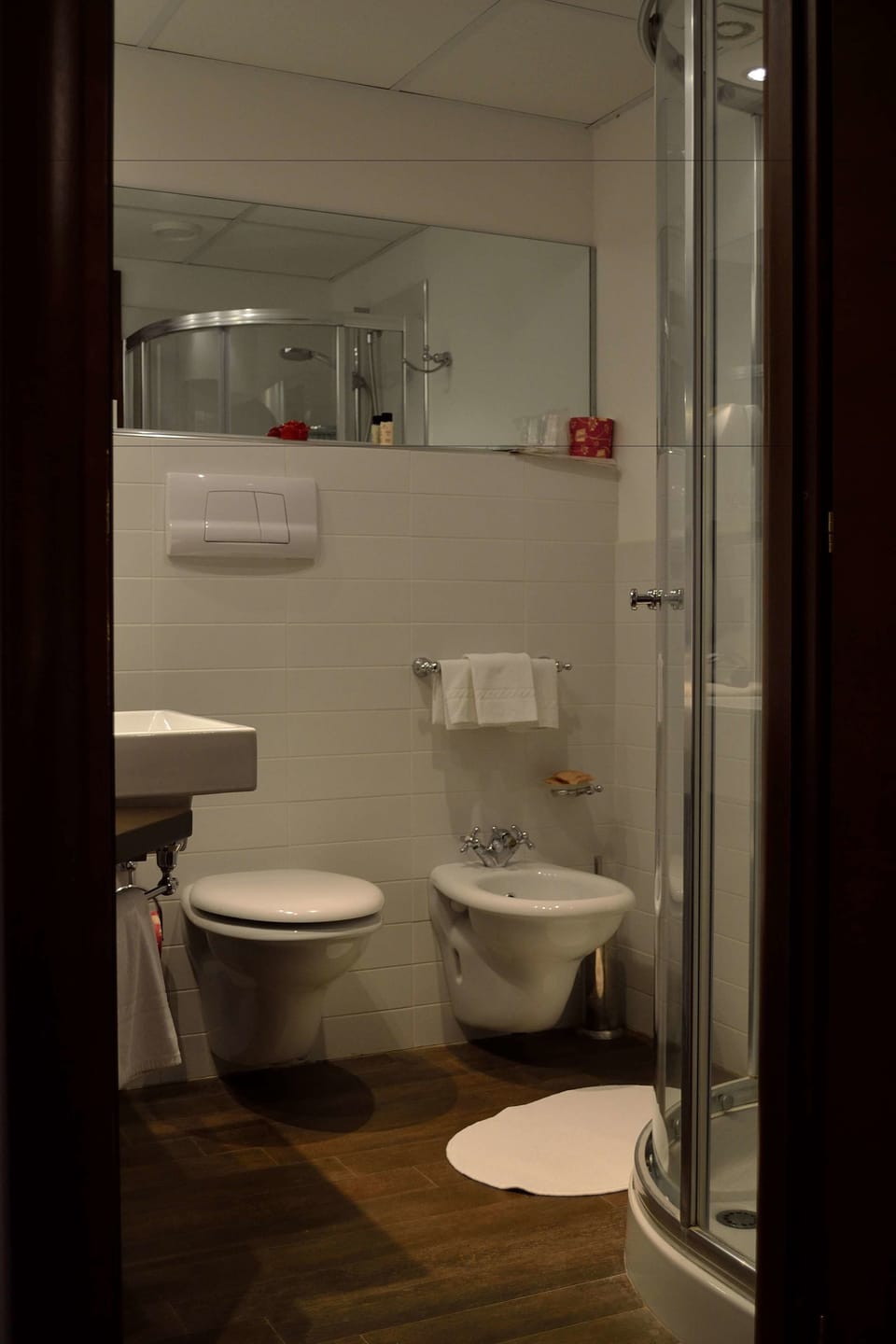 Shower, free toiletries, hair dryer, slippers