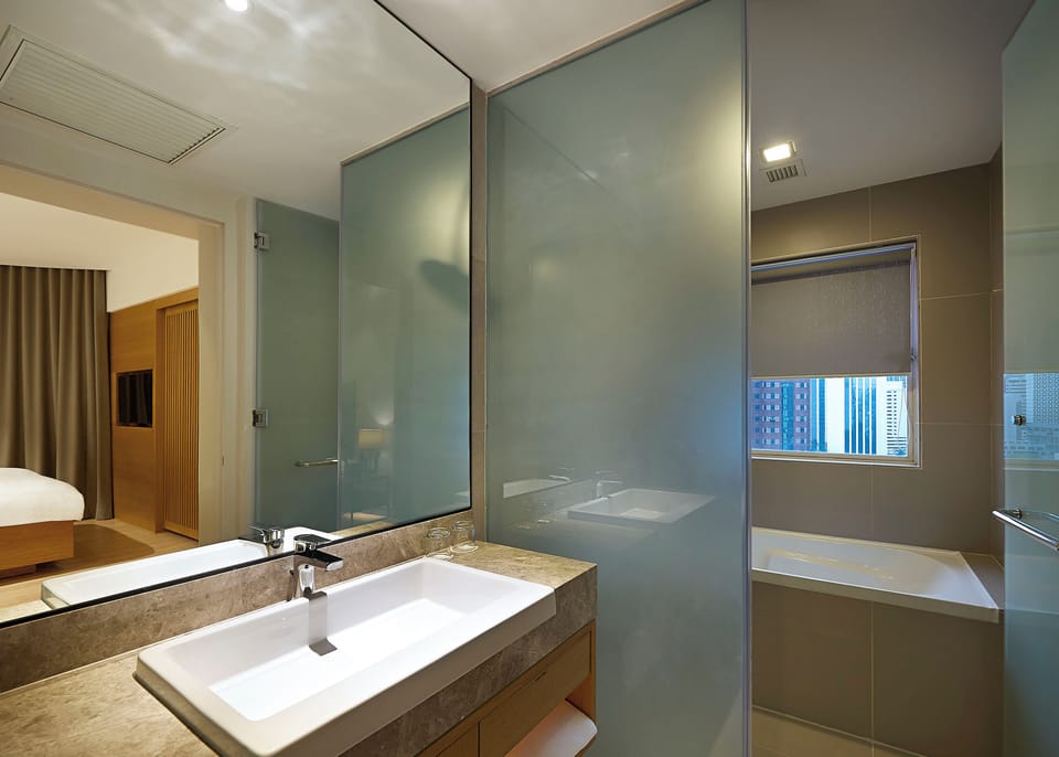 ANSA Suite | Bathroom | Shower, hair dryer, slippers, bidet