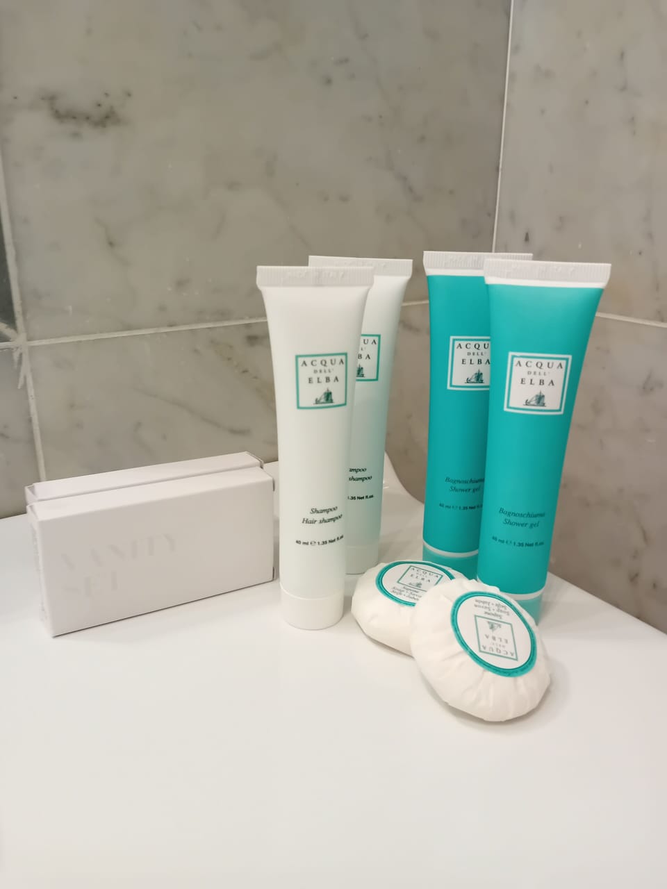 Shower, hair dryer, slippers, towels