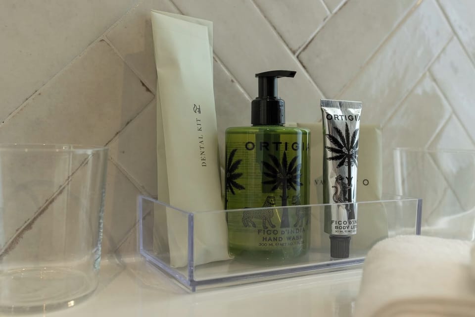 Junior Studio Suite, Sea View | Bathroom | Shower, hair dryer, slippers, bidet