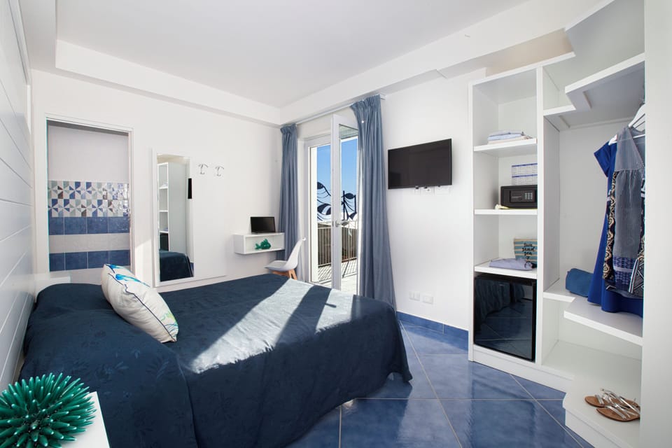 Deluxe Double Room | Desk, iron/ironing board, free wired internet, bed sheets