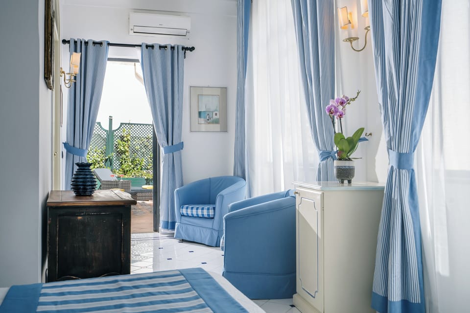 Apartment, 2 Bedrooms, Balcony, Sea View | Premium bedding, minibar, in-room safe, individually decorated