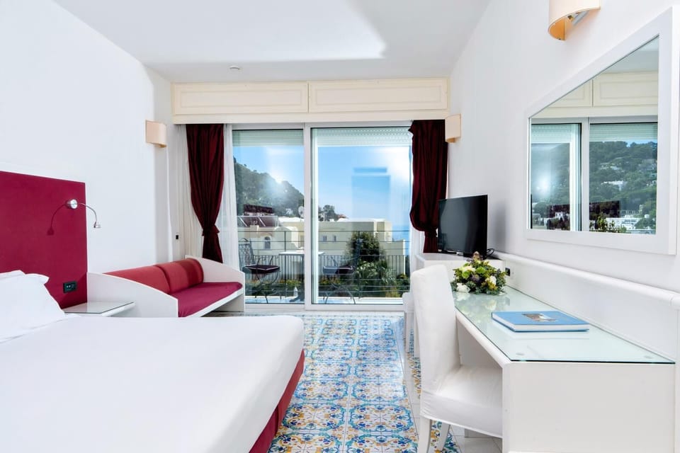 Superior Double or Twin Room, Garden View | Minibar, in-room safe, desk, laptop workspace