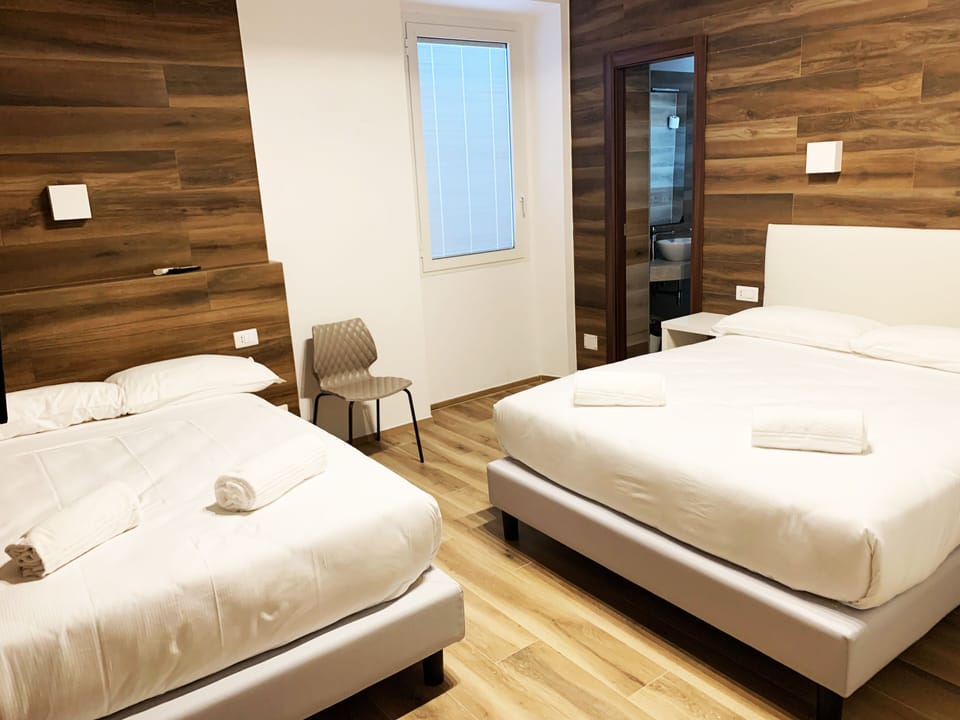 Quadruple Room | Premium bedding, in-room safe, free cribs/infant beds, free WiFi