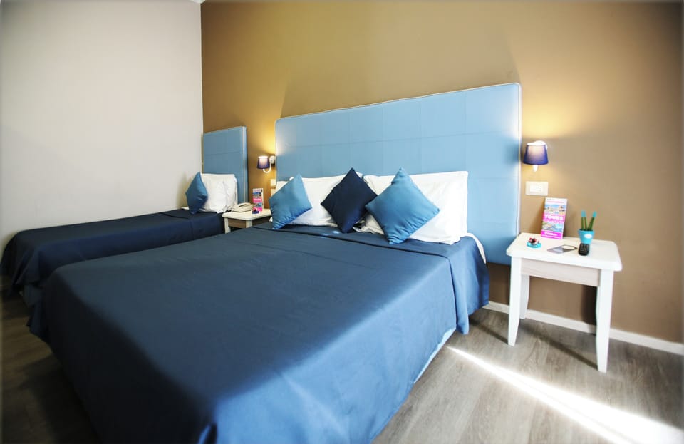 Quadruple Room | Egyptian cotton sheets, premium bedding, Select Comfort beds, minibar
