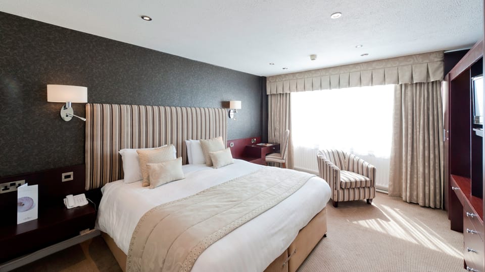 Hypo-allergenic bedding, desk, laptop workspace, iron/ironing board