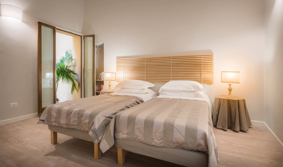 Apartment, 2 Bedrooms | Down comforters, in-room safe, soundproofing, free WiFi