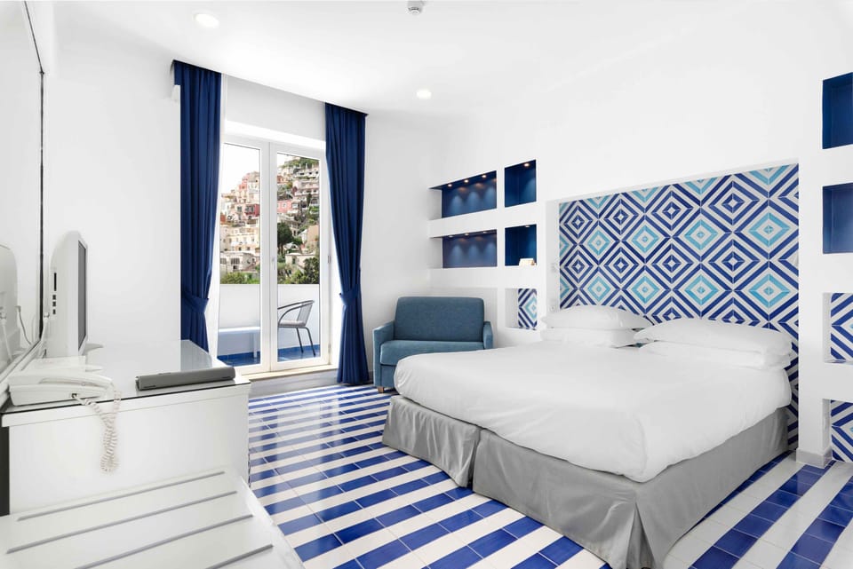 Comfort Double or Twin Room, Balcony, Sea View | Minibar, in-room safe, desk, blackout drapes