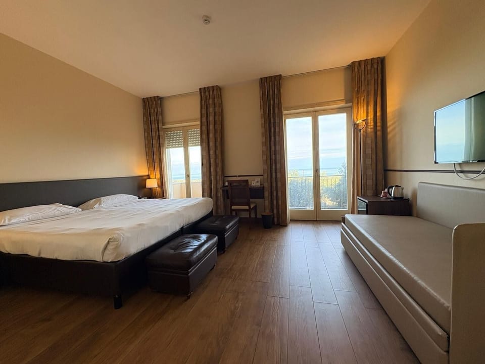 Superior Room + | Minibar, in-room safe, laptop workspace, iron/ironing board