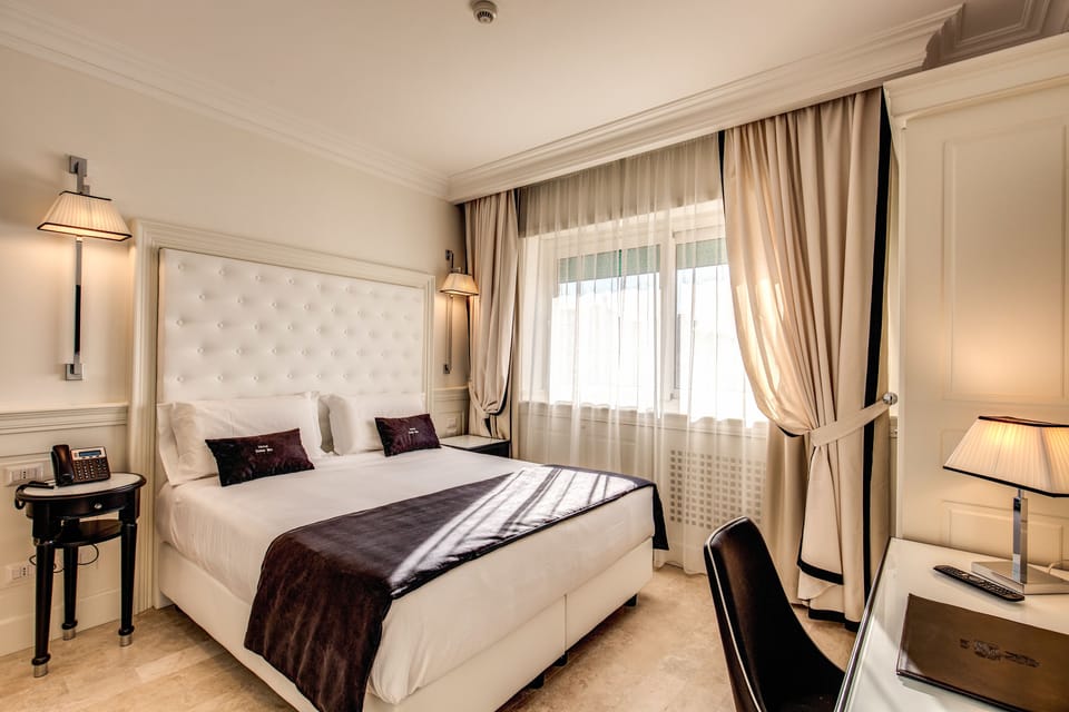 Minibar, desk, blackout drapes, soundproofing