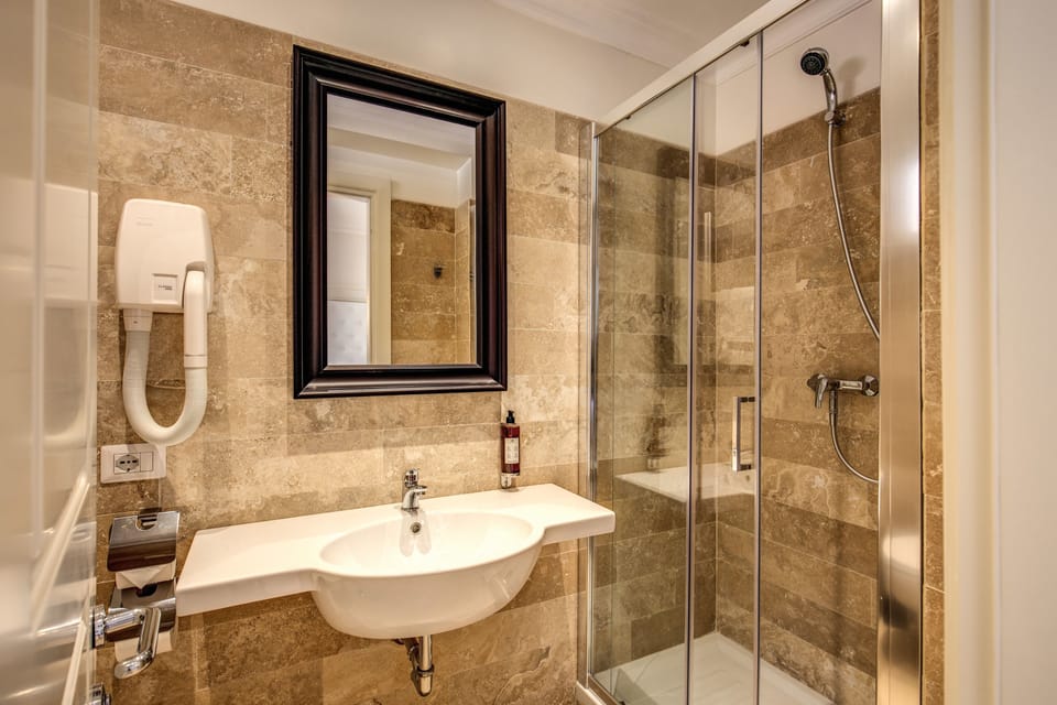 Shower, free toiletries, hair dryer, bidet