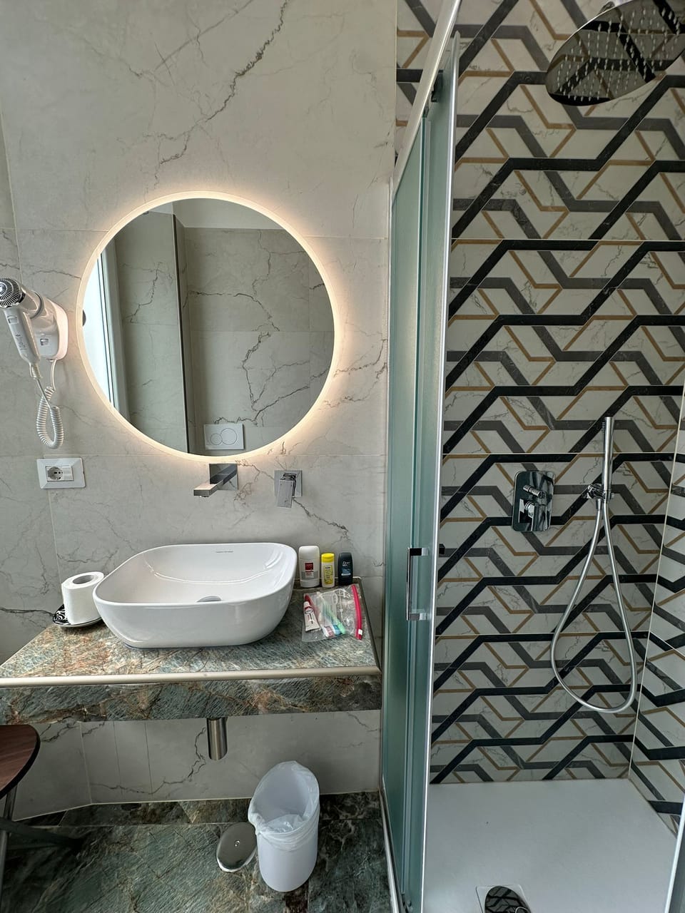 Quadruple Room | Bathroom | Shower, hair dryer, towels, soap